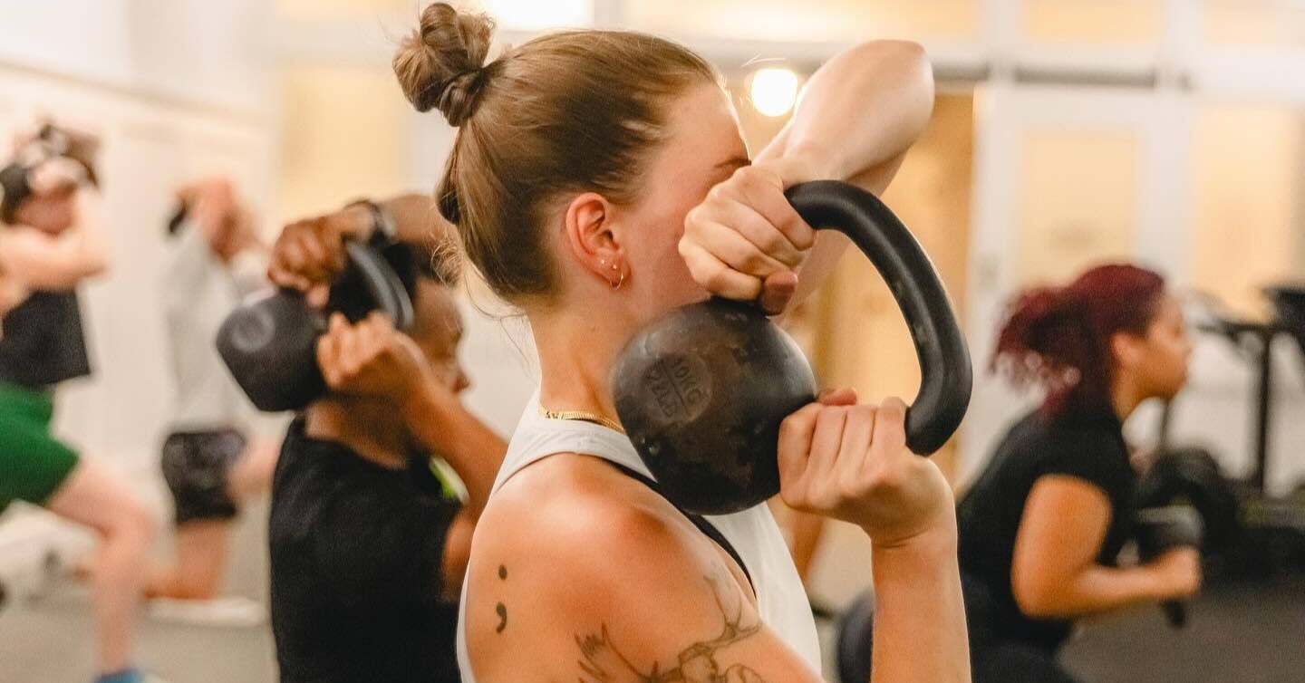 Athlete performing shoulder strengthening exercise during physical therapy session at MOTIVNY in NYC Athlete performing shoulder strengthening exercise during physical therapy session at MOTIVNY in NYC