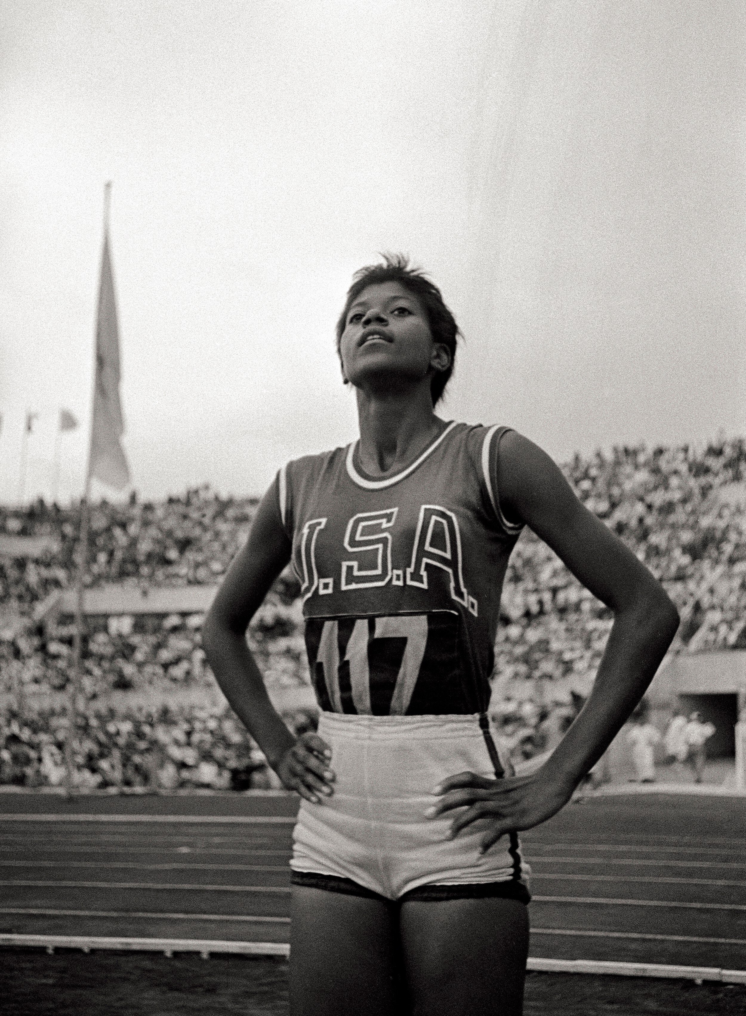 Wilma Rudolph standing with hands on hips